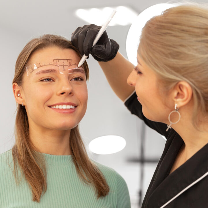 beautiful-young-woman-going-through-microblading-treatment
